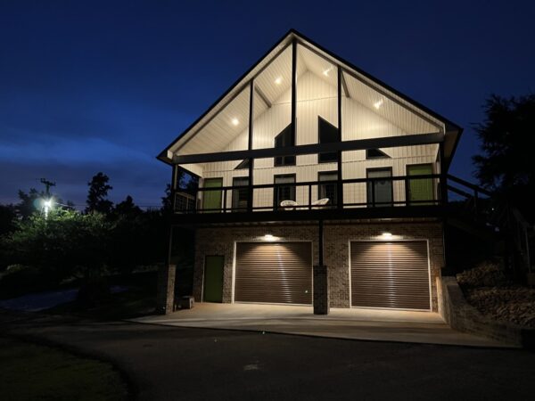 Beautiful house with white lights and garage